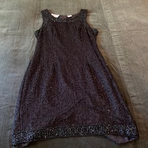 Perfect condition black beaded dress. Worn once.